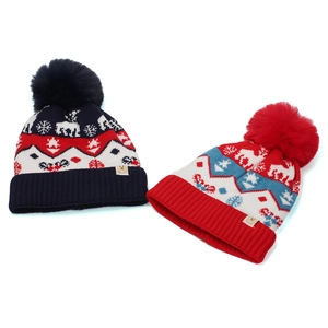 Winter knit beanie for kids with festive reindeer snowflake patterns and faux fur pom