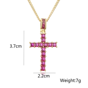 Detailed size view of a gold cross pendant with ruby gemstone, 3.7cm height and 7g weight