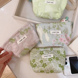 Mini floral jacquard canvas zipper pouches in green and pink for makeup and cards