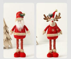 Detail of plush Christmas doll with red sequins and striped long legs for festive decor