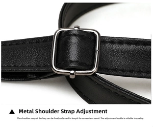 Macro detail of black litchi grain leather strap with adjustable gunmetal buckle hardware