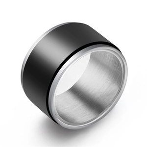 Top view of 8mm men's spinner ring with black matte surface and polished silver edges