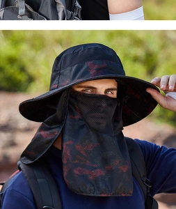 Detail of black and red camo sun hat featuring a mesh face mask and neck protection flap