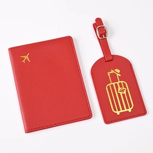 Red PU leather passport holder and luggage tag set with golden travel stamp patterns