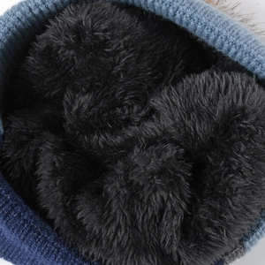 Winter knitted hat with thick black fleece lining for extra warmth and soft texture