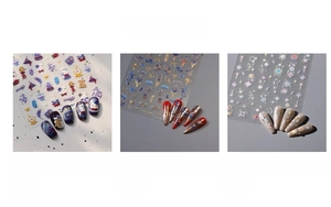 Detailed view of cute cartoon dog nail art stickers in various styles and textures