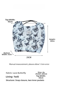 Lace tote bag dimensions with butterfly pattern, snap closure and inner pockets