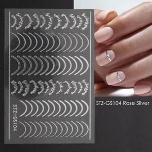 Detailed close-up of Rose Silver nail art stickers with metallic curves and STZ-GS104 patterns