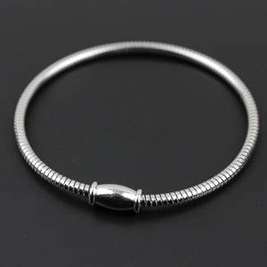 Close-up of silver stainless steel snake chain bracelet with smooth magnetic clasp