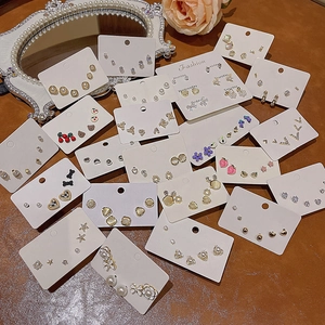 Elegant S925 silver needle earring set featuring opal and pearls in various stylish designs