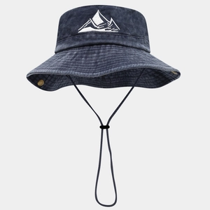 Detail of outdoor sun hat with mountain embroidery and adjustable windproof cord