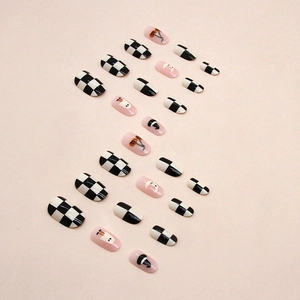 Funny checkerboard press-on nails with Halloween ghost and pumpkin designs