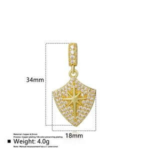Macro shot of 18k gold plated shield pendant with zircon star and detailed dimensions