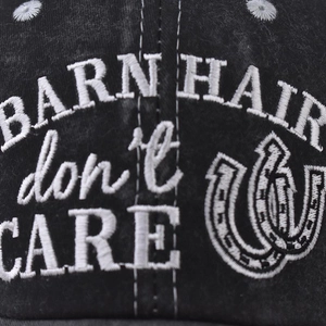 Washed cotton messy bun baseball cap featuring Barn Hair Don't Care white embroidery