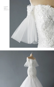 Detailed embroidery and sequins on off-shoulder mermaid wedding dress with mesh sleeves