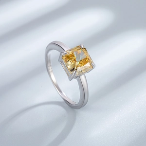 925 sterling silver ring featuring a large square yellow ice cut carbon diamond