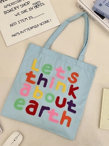 Light blue canvas tote bag with colorful towel embroidered Let's think about earth slogan