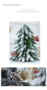 Detailed view of mini Christmas tree with artificial snow, pine cones and red berries