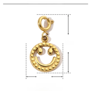 Macro shot of 18mm golden stainless steel smiley face charm with size measurements