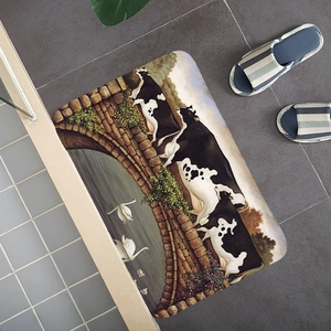 Detail of a rectangular non-slip rug with vintage cow painting and stone bridge pattern