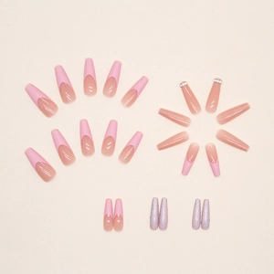 Long ballet press-on nails with pink French tips, rhinestones, and purple glitter shards