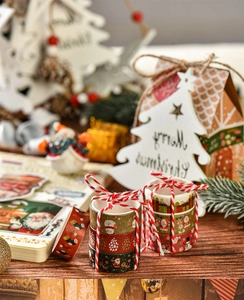 Detailed close-up of 6-roll Christmas washi tape set tied with red and white cotton twine