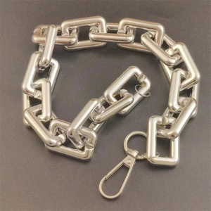 Thick silver rectangular link chain accessory with swivel lobster clasp on dark background