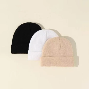 Three-pack ribbed knit beanies in black, white, and beige for kids autumn winter warmth