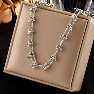 Silver twist chain necklace in titanium steel on luxury jewelry box, punk hip hop style