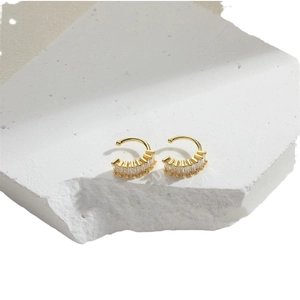 Minimalist gold ear cuffs with sparkling white baguette zircon on stone base