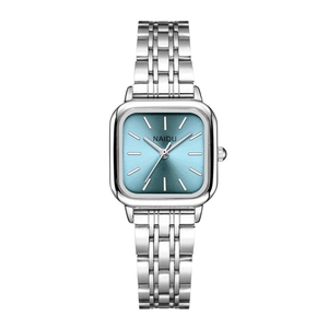 Macro shot of a silver square watch case with a blue sunburst dial and metal strap