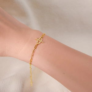 Minimalist S925 silver chain bracelet with micro-pave zircon on golden oval link