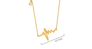 Detailed view of gold heartbeat necklace with EKG pendant and miniature heart charm