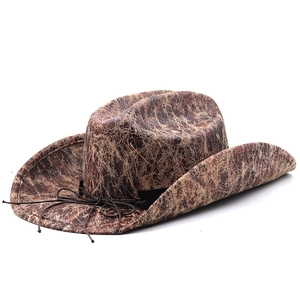 Vintage western cowboy hat with distressed brown texture and braided rope detail