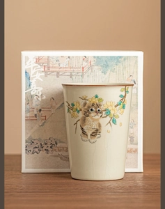 Ceramic cat tea cup with floral pattern and matching traditional style gift box