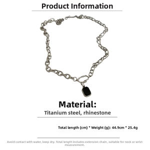 Detail view of steel necklace with black rectangle stone pendant showing 44.9cm length