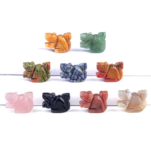 Hand-carved natural crystal toad and frog figurines in various colorful gemstones
