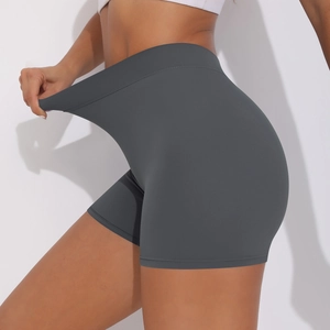 Close-up of high-waist yoga shorts showing the stretchable fabric and scrunch detail