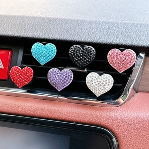 Sparkling rhinestone heart-shaped car air vent aromatherapy clips in six vibrant colors