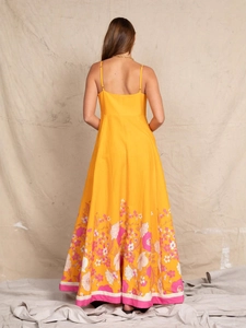 Sexy backless floral maxi dress in yellow with spaghetti straps for beach vacations