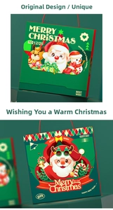 Detail of Christmas gift paper bags with festive Santa illustrations and red handles