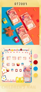Close-up of pink and yellow cartoon press-on nails for kids with adhesive backing