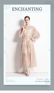 Detail of colorful floral maxi dress featuring a mandarin collar and tassel waist tie