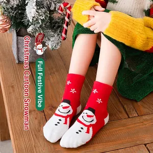 Cozy red and white Christmas knit crew socks with cute snowman pattern for children