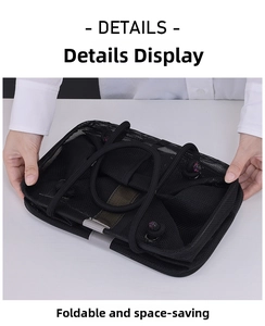 Folded detail of the black mesh shower organizer bag with gray snap fastener strap