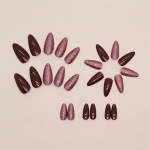 Sparkly cherry red and glittery purple press-on nails in medium almond shape, 24 piece set