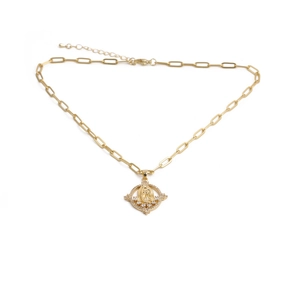 Close-up of gold paperclip chain necklace with Virgin Mary pendant and zircon stones