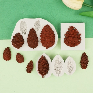Detailed view of pinecone silicone molds and brown fondant crafts in various sizes