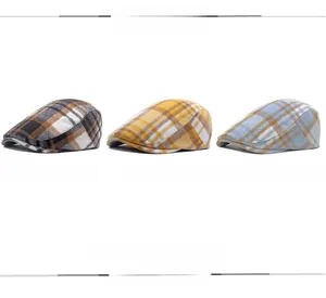 Detailed grid showing black, yellow, and sky blue plaid patterns on wool flat caps
