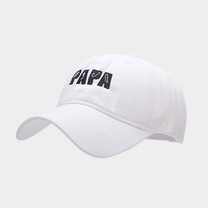 Detail of white cotton baseball cap with black PAPA embroidery and curved brim